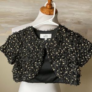Belle Badgley Mischka metallic gold/black shrug